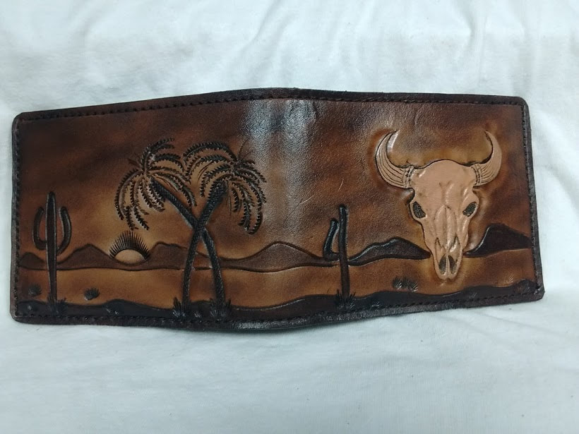 Handcrafted leather wallet Cow skull desert